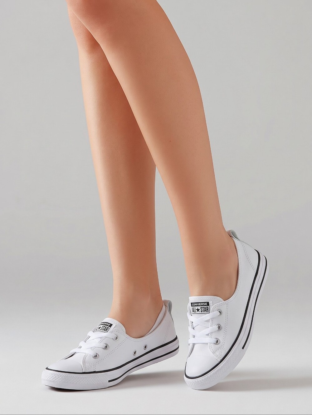 Converse White Low-Top Slip On Sneakers with Black Trim